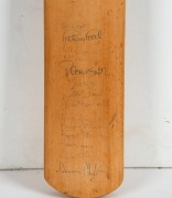 A full size cricket bat with Australia v England Test Series 1990/91 decal; signed to front of blade by both teams (some faded) and verso Test greats including Bill Lawry, Richie Benaud, Ian Chappell, Geoff Boykott, Mike Gatting, etc.&nbsp; - 5