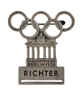 1936 BERLIN OLYMPICS Referee or Judge's Badge in silvered bronze, 45 x 42cm, made by L. Chr. Lauer, Nurnberg-Berlin and designed by Walter Raemisch; inscribed RICHTER, numbered "156" on reverse, with clip mechanism intact. Lacks ribbon.The design combines