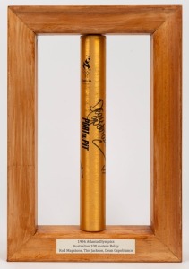 1996 ATLANTA OLYMPICS: relay baton signed by Australian runners Rod Mapstone, Tim Jackson, and Dean Capobianco. Attractively presented in a timber frame. Overall 38 x 25cm