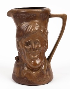 A 1977 centenary test commemorative jug depicting Greg Chappell and Tony Greig (the opposing captains) from a limited edition by Bendigo Pottery; numbered 79/300, with certificate. 17cm high.