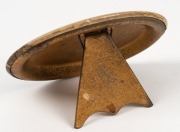 PHAR LAP: A small celluloid tin-plate oval depicting the classic image of jockey, Jim Pike riding Phar Lap at Flemington Racecourse, sometime in 1930. The sepia image has been carefully enhanced to reflect the correct colours of Pike's&nbsp; jacket. Overall 93 - 2