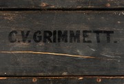 CLARRIE GRIMMETT'S large travelling trunk used to transport his cricket equipment, boots and clothing; with painted "C.V. GRIMMETT" to the top and with large (part) paper label on side panel headed "AUSTRALIAN CRICKET XI, ENGLISH TOUR 1934" with Grimmett' - 2