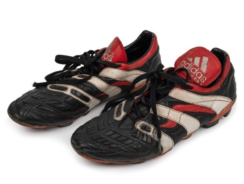 Nathan Buckley’s match worn boots circa 2000. Adidas boots with ‘5’ handwritten on back of boot (this was usually done by club bootstudders so they could easily keep track of which boots belonged to particular players). Black with red piping and white str