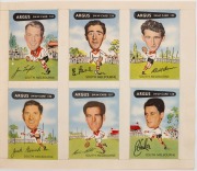 1954 Argus "Football Swap Card" large part set [130/144] stuck down in an original "The Argus" swap card album. - 2