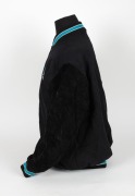 Nathan Buckley&rsquo;s Allies team jacket from 1995. Thick bomber jacket with press studs, Allies badging on breast and piping in Allies colours of teal, black and white on cuffs and edges. - 3