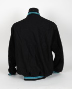Nathan Buckley&rsquo;s Allies team jacket from 1995. Thick bomber jacket with press studs, Allies badging on breast and piping in Allies colours of teal, black and white on cuffs and edges. - 4