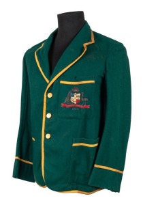 AUSTRALIAN 1934 TEST TEAM BLAZER, Clarrie Grimmett's Test blazer worn on his tour of England; green wool with yellow trim, embroidered with the Australian coat of arms in gold and silver wire and coloured thread incorporating the date "1934"; Farmer's Syd