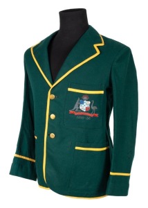 AUSTRALIAN 1935-36 TEST TEAM BLAZER, Clarrie Grimmett's Test blazer worn for the tour of South Africa; green wool with yellow trim, embroidered with the Australian coat of arms in gold and silver wire and coloured thread incorporating the dates "1935-36"; Framers Sydney labels to collar with "C.GRIMMETT" in pen. Provenance: The Clarrie Grimmett Collection; his family, by descent.