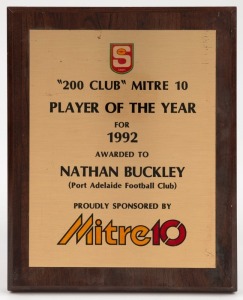 1992 Mitre 10 Player of the Year, won by Nathan Buckley. Wooden plaque with metal plate inscribed, Mitre 10 ‘200 Club’ SANFL Player of the Year.