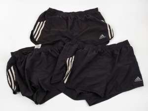 Group of general training shorts worn by Nathan Buckley during his playing days at Collingwood. All adidas and black with white stripes. (3 pairs).