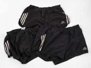 Group of general training shorts worn by Nathan Buckley during his playing days at Collingwood. All adidas and black with white stripes. (3 pairs).