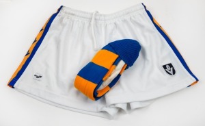 Pair of blue and yellow socks worn by Nathan Buckley when playing for Williamstown in 2007 together with his Sekem-branded playing shorts. (2 items).