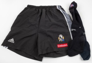 Nathan Buckley’s Collingwood game socks and training shorts, early 2000s. The socks with AFL logo at top with ‘CFC’ and ‘adidas’ lower down. The shorts with adidas, Emirates and CFC branding. (3 items).