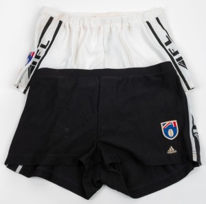 Nathan Buckley’s Collingwood playing shorts, circa 1998-99. Two pairs – one white and one black; both with stylized AFL branding down the sides, AFL logo on the left and adidas logos. No sponsors patch.