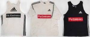 Collingwood training tops worn by Nathan Buckley; with ‘Fly Emirates’ patch on front, and with adidas logos. (3 different examples).
