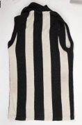 Group of three football jumpers acquired by Nathan Buckley during his football career. One is an older Collingwood-style guernsey without number or other identifying patches. The second is a Melbourne/Norwood style Brandella brand jumper bearing #51, but - 5