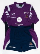 Two different Melbourne Storm guernseys and a pair of Storm shorts, given to Nathan Buckley by the Melbourne Storm team. (3 items). - 2