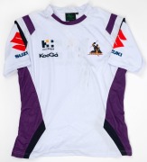 Two different Melbourne Storm guernseys and a pair of Storm shorts, given to Nathan Buckley by the Melbourne Storm team. (3 items). - 3