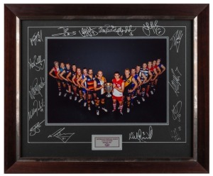 AFL Captains 2007. A framed photograph of all the AFL club captains for the 2007 season, with original signatures of all the captains in the mount. Presented to the captains by the AFL.