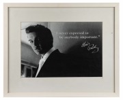 Framed photo of a young Elvis Presley with the words, &ldquo;I never expected to be anybody important&rdquo;.