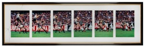 A superb sequence of photos showing Nathan Buckley’s mark over Essendon’s Mark Fraser in 1998. Framed & glazed.