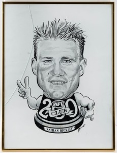 BUCKLEY'S 200th GAME: A caricature of Nathan Buckley drawn by artist Col Bodie, to commemorate Buckley’s 200th AFL game in 2002. The black and white caricature is presented in a gold frame.