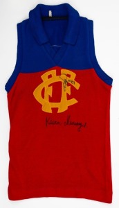 KEVIN MURRAY original signature to the front of a 1970's FITZROY Football Club short-sleeved jumper. The Fitzroy logo is also signed by Martin Pike.