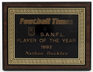 1992 Football Times SANFL Player of the Year award, won by Nathan Buckley. Wooden plaque with metal plate.