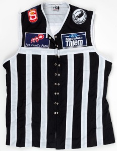 2001 Port Adelaide guernsey, #34. Lace-up guernsey bearing Buckley’s old #34, given to him as a souvenir upon his return to the club for a visit, most likely the 1992 Premiership 10-year reunion. Maughan Thiem Ford and Pro Paint n Panel sponsor patches on front, and Charlie’s Diner on the back.