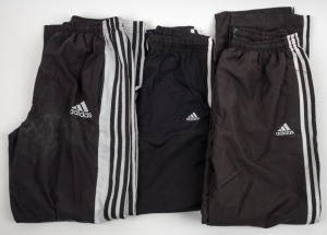 Group of track pants and leggings worn by Nathan Buckley during his playing days at Collingwood. All adidas. Variety of different styles. (Six pairs)