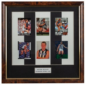Framed group of six Nathan Buckley footy cards c1994-97 presented on a black-and-white striped background. With engraved plaque reading ‘Nathan Buckley, Collingwood Football Club.’ Origin unknown; gifted to Buckley.