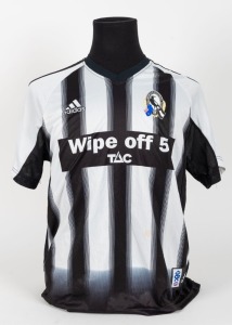 Collingwood black-and-white-striped training top/T-shirt, circa 2005-08. With ‘Wipe Off 5 TAC’ in black bar across middle, adidas logo top right, Collingwood logo top left.