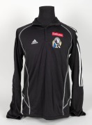Nathan Buckley&rsquo;s Collingwood players&rsquo; jacket/track top, circa 2006. Black adidas short-zip jacket with adidas logo top right, Fly Emirates top left and Collingwood logo beneath that. Fly Emirates logo is the single line version. Rear is blank.