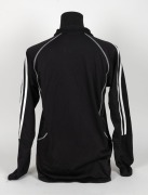 Nathan Buckley&rsquo;s Collingwood players&rsquo; jacket/track top, circa 2006. Black adidas short-zip jacket with adidas logo top right, Fly Emirates top left and Collingwood logo beneath that. Fly Emirates logo is the single line version. Rear is blank. - 3