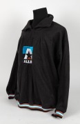 Nathan Buckley’s Allies team jacket from 1996-97. Thick, short-zipped, collared jacket with Allies logo in middle (teal/black with black star and orange flash), with orange, teal and white trim. - 2