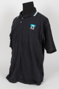 Nathan Buckley’s Allies team polo 1996-97. Black with teal/black + star logo on breast, with orange, teal and white trim. - 2