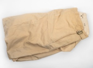 An early pair of Clarrie Grimmett's pure wool cricket flannel trousers; with his name in manuscript to the back inside waistband; maker unknown.