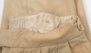 An early pair of Clarrie Grimmett's pure wool cricket flannel trousers; marked C.V.G. in manuscript to the back inside waistband; with "Daks" maker's label. - 2