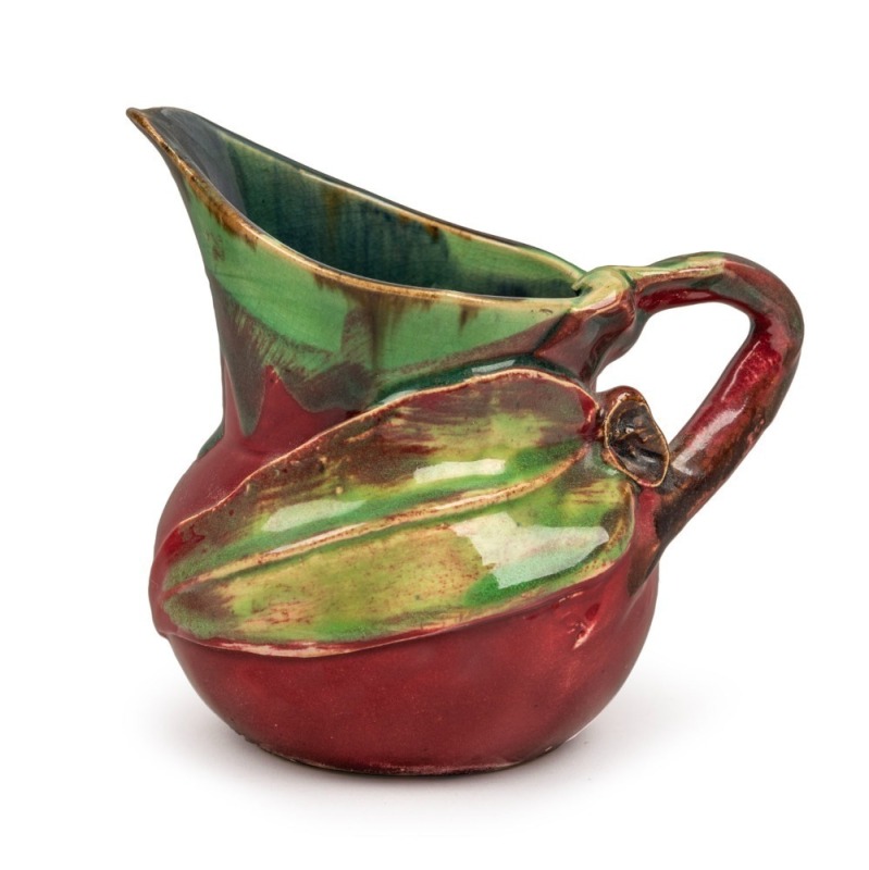 REMUED early pottery jug with applied gumnut and leaf with branch handle, unusually dark pink and green colourway, incised "Remued" with circular black ink stamp, ​​​​​​​10.5cm high