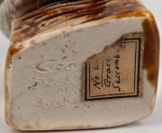 GRACE SECCOMBE pottery statue of a kookaburra on a log, incised "Grace Seccombe, N.S.W., Australia" with original paper label "No.2, Grace Seccombe", 7cm high - 5