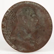 DORA OHLFSEN (1877 - 1948), LT. GEN. SIR JOHN MONASH. G.C.M.G., K.G.B., D.C.L., L.L.D. GALLIPOLI. MESSINES. PASCHENDALE. AMIENS. HAMEL. PERONNE. BULLICOURT. 1914 - 1919, large brass medallion with Monash's profile and text in relief, signed DORA OHLFSEN, - 2