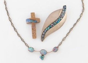 An Australian silver and opal gumleaf brooch stamped "SCANDIA SILVER", a cross pendant made from opal vein in matrix, and an opal pendant on affixed chain with rose gold bulldog clasp, (3 items), ​​​​​​​the brooch 6.5cm long