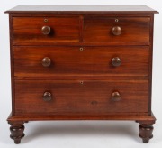 An antique Australian cedar chest of four drawers with circular brass escutcheons, New South Wales origin, circa 1855, 91cm high, 97cm wide, 43cm deep