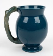 CRUFFEL Australian porcelain jug with windswept tree handle and decoration glazed in blue and green, 13cm high - 2