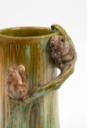 REMUED rare pottery tree stump vase adorned with two koalas on branch handle, incised "Remued, 7LB", an impressive 23.5cm high - 3