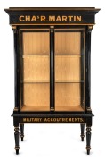 CHARLES R. MARTIN "MILITARY ACCOUTREMENTS" historically important stunning pair of ebonized and gilt display cabinets from the 1888 MELBOURNE EXHIBITION, with accompanying silk embroidered banner and Australian cedar hand-painted advertising wall plaque, - 2