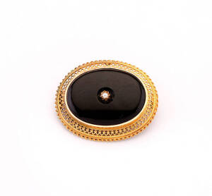 BROOCH: Victorian onyx and seed pearl mourning brooch.&nbsp;