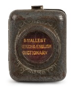 GASC'S LOCKET FRENCH DICTIONARY the "Smallest French & English Dictionary" contained in a small metal locket with window front, [David Bryce & Sons],&nbsp;vii,648(1) printed pages. Printed on fine india paper. Last printed page covers English coins and measure