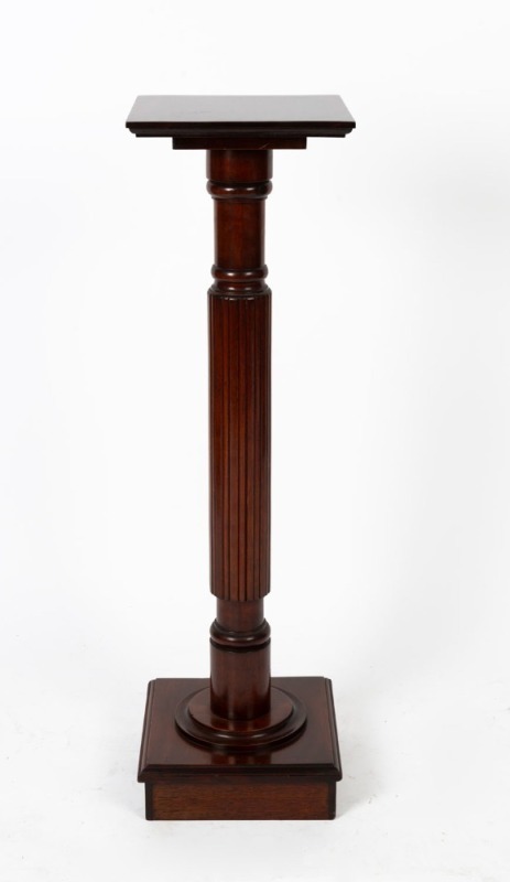 An Australian blackwood pedestal with square top, conforming moulded plinth base and finely reeded trunk, circa 1920, 102cm high, 29.5cm wide, 29.5cm deep