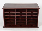 An Australian cedar desk-top pigeonhole unit, circa 1900, 41cm high, 73.5cm wide, 42cm deep